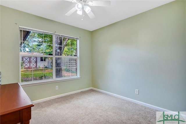 11 Pelican Ct, Richmond Hill, GA 31324 - spare room with baseboards, carpet flooring, and a ceiling fan