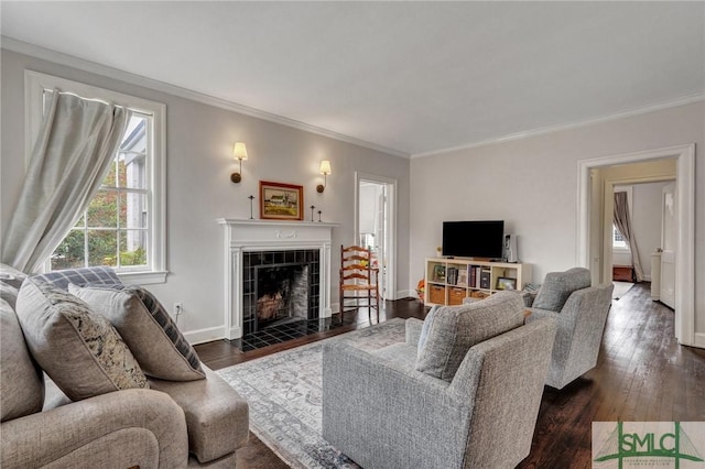 19 E 54th St, Savannah, GA 31405 - living room with crown molding, a fireplace, dark wood-style flooring, and baseboards
