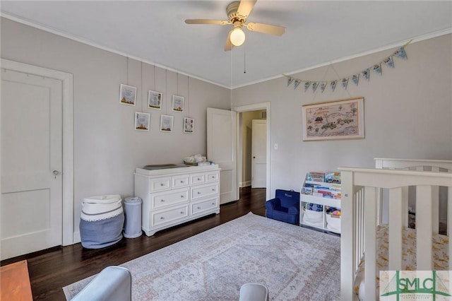 19 E 54th St, Savannah, GA 31405 - bedroom featuring wood finished floors, ornamental molding, ceiling fan, and a crib