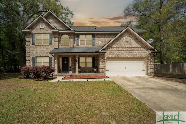 view of front of house featuring brick siding, a porch, an attached garage, and driveway