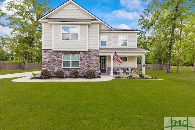 craftsman-style house with stone siding and a porch