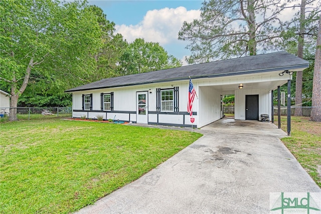 938 Greenbriar Trl, Hinesville, GA 31313 - view of front of house featuring concrete driveway and a carport