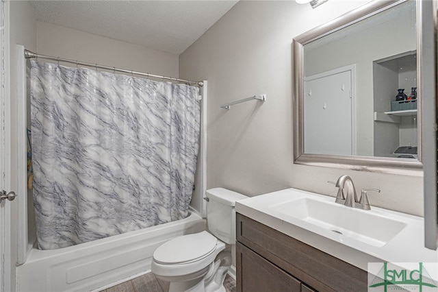 938 Greenbriar Trl, Hinesville, GA 31313 - bathroom with shower / bath combo, toilet, vanity, a textured ceiling, and wood finished floors