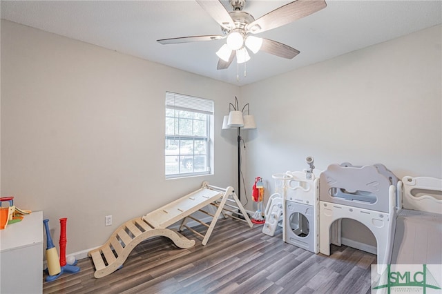 938 Greenbriar Trl, Hinesville, GA 31313 - laundry area featuring wood finished floors, baseboards, and ceiling fan