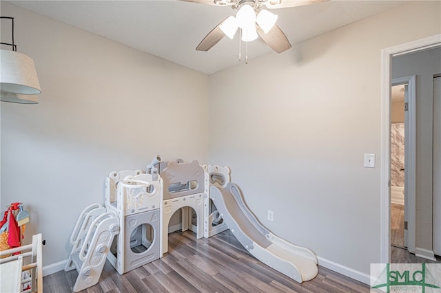 938 Greenbriar Trl, Hinesville, GA 31313 - laundry area featuring wood finished floors, ceiling fan, and baseboards