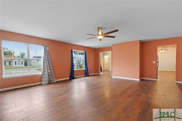 133 Berwick Lakes Blvd, Pooler, GA 31322 - unfurnished living room with a ceiling fan, hardwood / wood-style floors, and baseboards