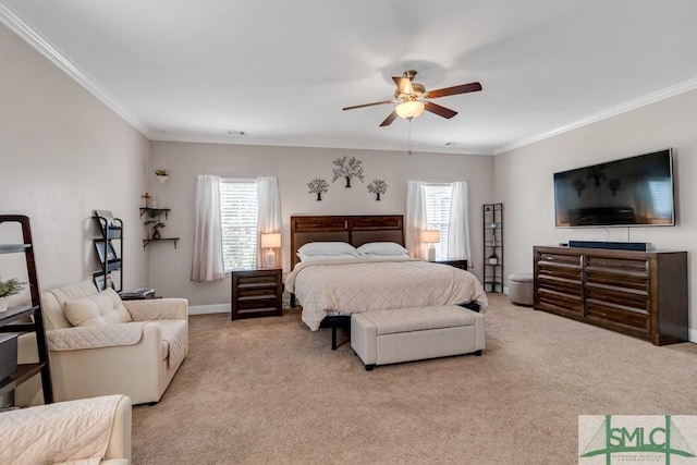 bedroom featuring multiple windows, light carpet, crown molding, ceiling fan, and baseboards