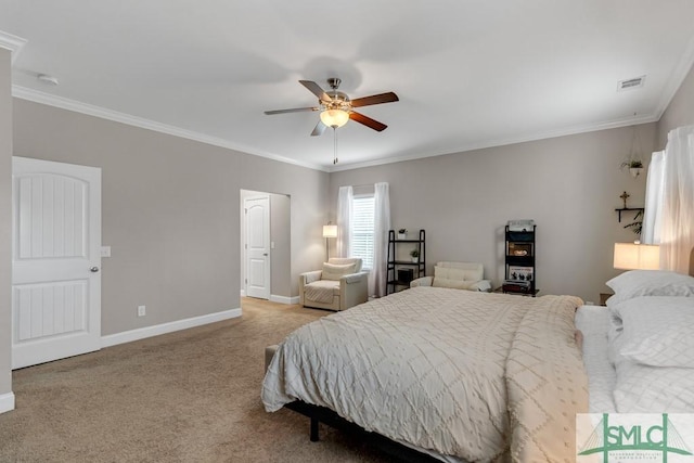 bedroom featuring carpet floors, baseboards, crown molding, and ceiling fan