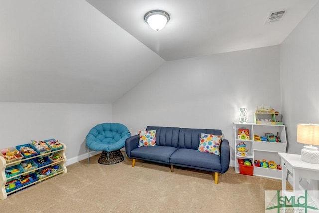 rec room featuring carpet, lofted ceiling, and baseboards