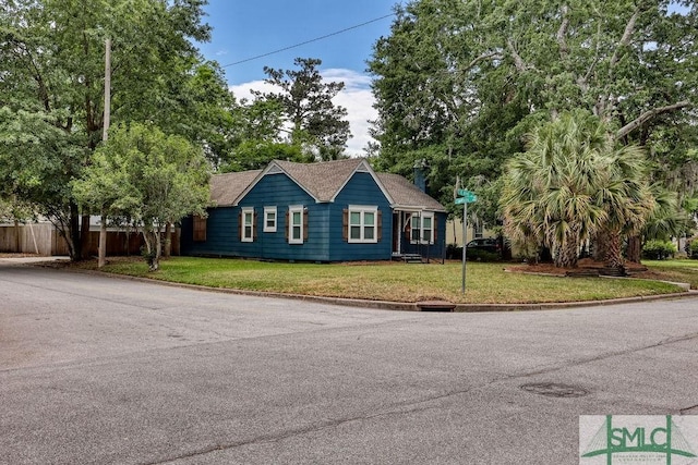417 E 61st St, Savannah, GA 31405 - view of front of house featuring roof with shingles