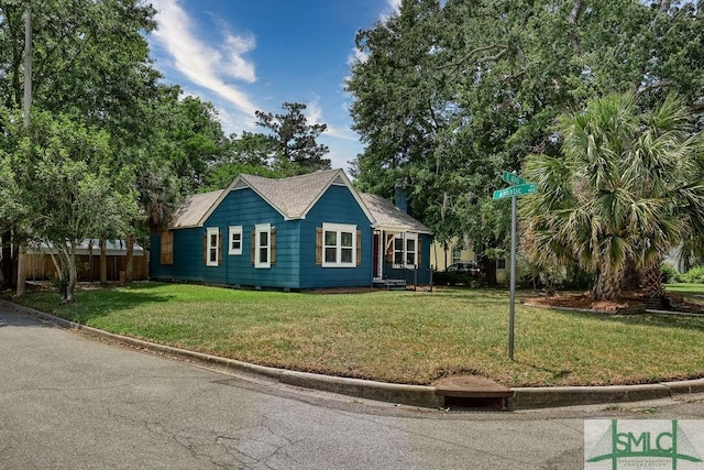 417 E 61st St, Savannah, GA 31405 - view of front of house with a shingled roof