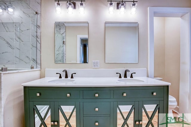 417 E 61st St, Savannah, GA 31405 - full bathroom with toilet, double vanity, and a shower