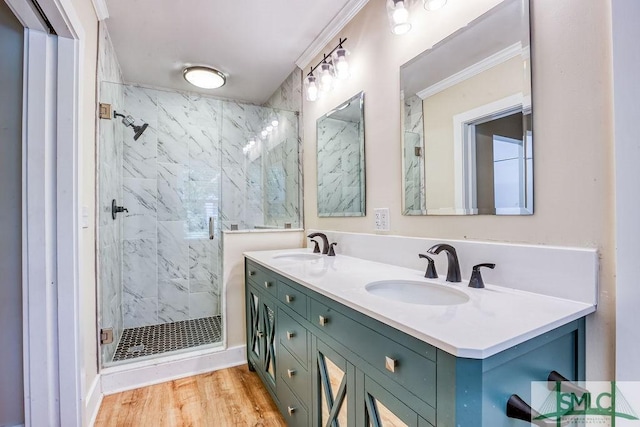 417 E 61st St, Savannah, GA 31405 - full bathroom featuring a marble finish shower, double vanity, wood finished floors, and ornamental molding