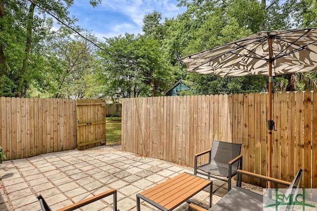 417 E 61st St, Savannah, GA 31405 - view of patio / terrace with a fenced backyard