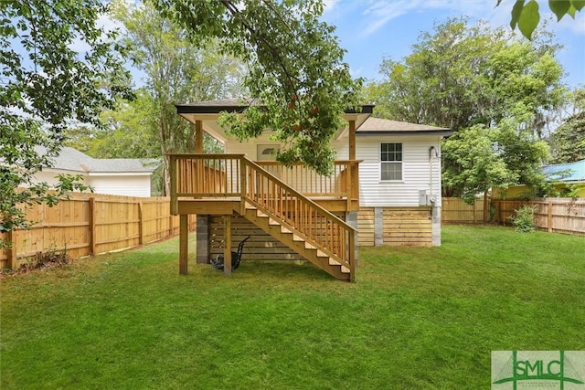 back of property featuring stairs and a deck