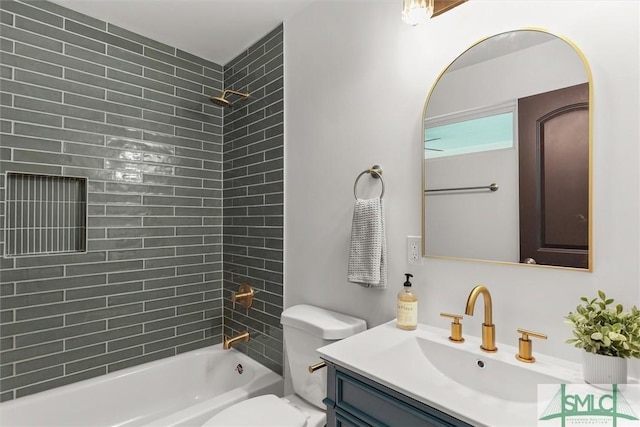 full bath with washtub / shower combination, toilet, and vanity