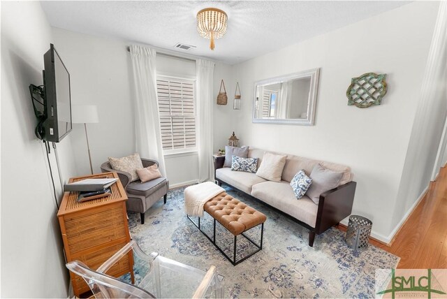 524 Nicoll St, Savannah, GA 31401 - living room with wood finished floors and baseboards