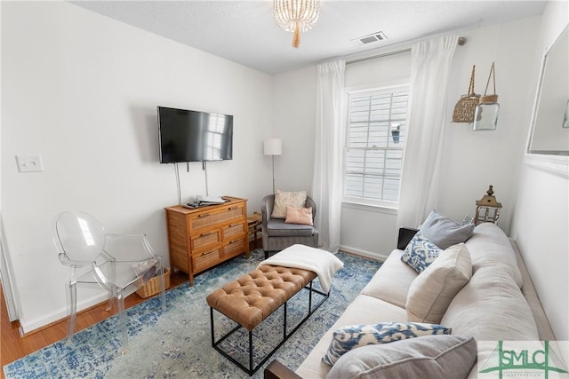 524 Nicoll St, Savannah, GA 31401 - living area with wood finished floors and baseboards
