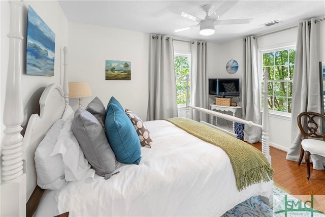 524 Nicoll St, Savannah, GA 31401 - bedroom featuring wood finished floors, ceiling fan, and baseboards