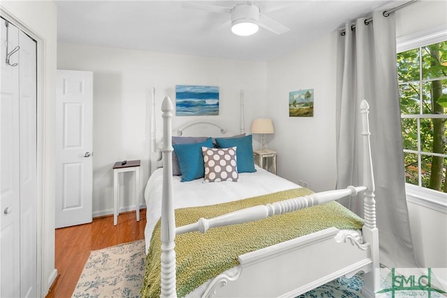524 Nicoll St, Savannah, GA 31401 - bedroom with wood finished floors and a ceiling fan