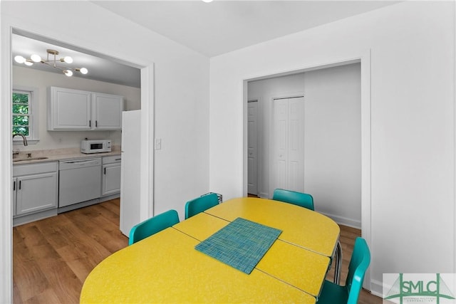 524 Nicoll St, Savannah, GA 31401 - dining space featuring light wood-style flooring