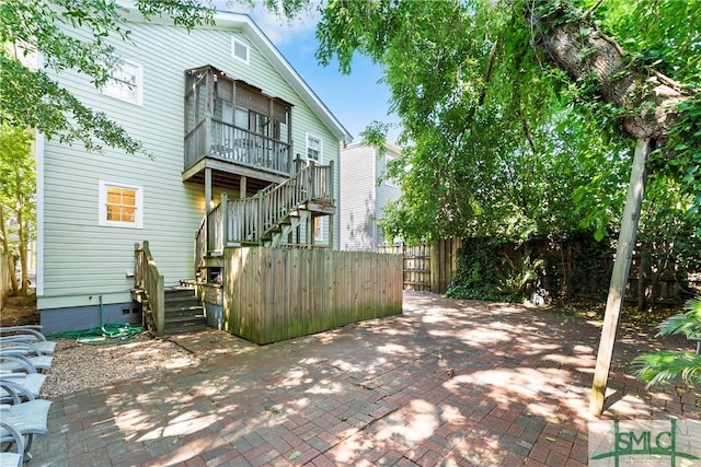 524 Nicoll St, Savannah, GA 31401 - rear view of property featuring stairway and a patio