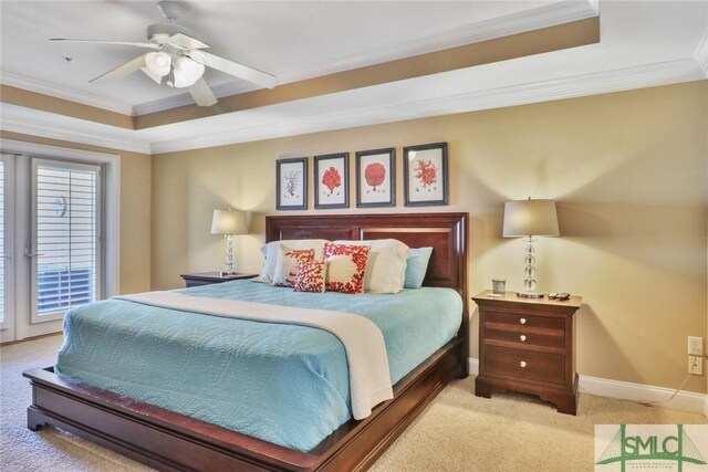 bedroom featuring a raised ceiling, carpet, ornamental molding, access to outside, and baseboards
