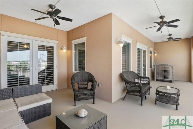 view of patio with ceiling fan, an outdoor hangout area, and french doors