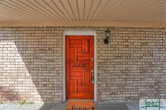 1507 Cloverdale Dr, Savannah, GA 31415 - doorway to property featuring brick siding