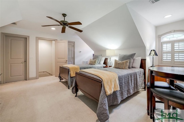 bedroom featuring light colored carpet, vaulted ceiling, recessed lighting, and a ceiling fan