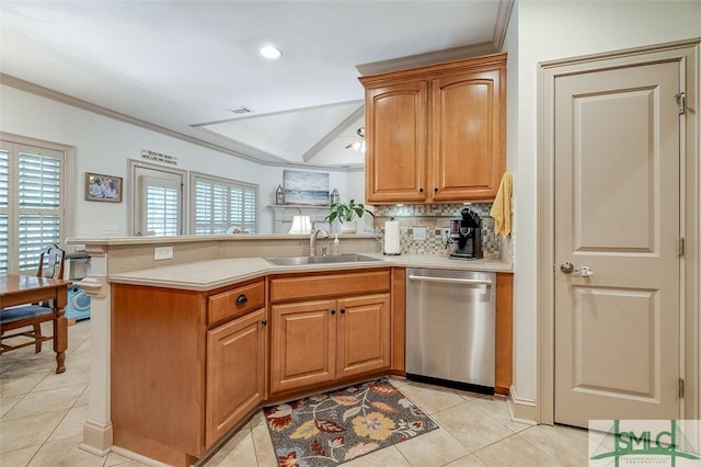 kitchen featuring stainless steel dishwasher, a sink, a peninsula, light countertops, and crown molding