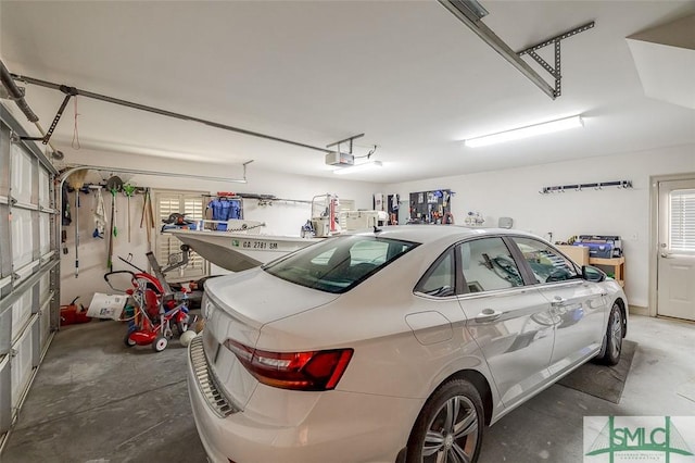 garage featuring a garage door opener