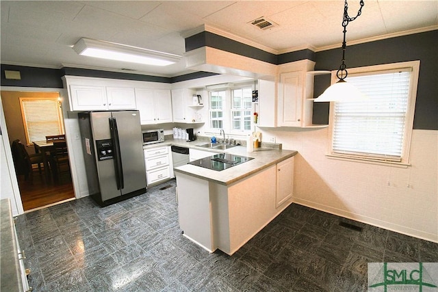 kitchen featuring stainless steel appliances, a peninsula, open shelves, crown molding, and hanging light fixtures