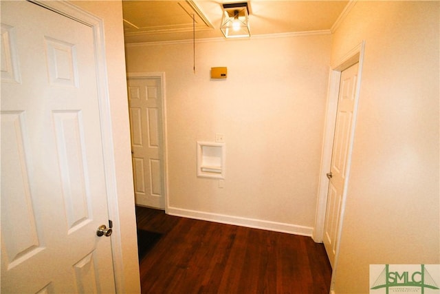 hall featuring dark wood-style floors, ornamental molding, and baseboards