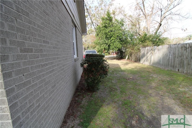 view of yard with fence