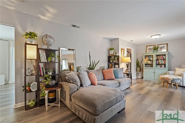 living area with wood finished floors