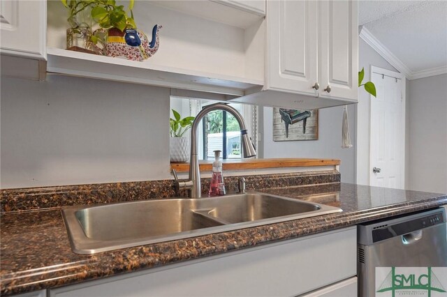 kitchen view of a sink, stainless steel dishwasher, ornamental molding, white cabinetry, and open shelves