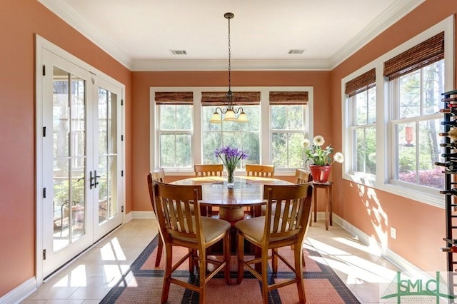 18 Enclave Cir, Savannah, GA 31419 - dining area with baseboards, french doors, ornamental molding, a chandelier, and light tile patterned floors