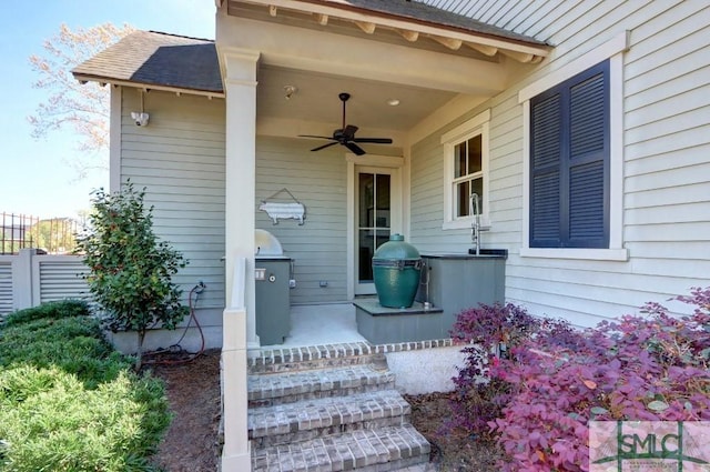 18 Enclave Cir, Savannah, GA 31419 - property entrance featuring ceiling fan, a shingled roof, and a security system