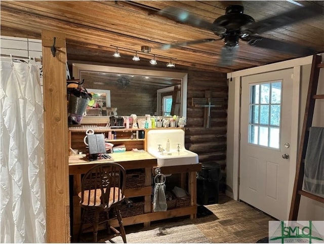 309 E 5th St, Rincon, GA 31326 - doorway to outside with wood finished floors, a ceiling fan, rustic walls, rail lighting, and wood ceiling