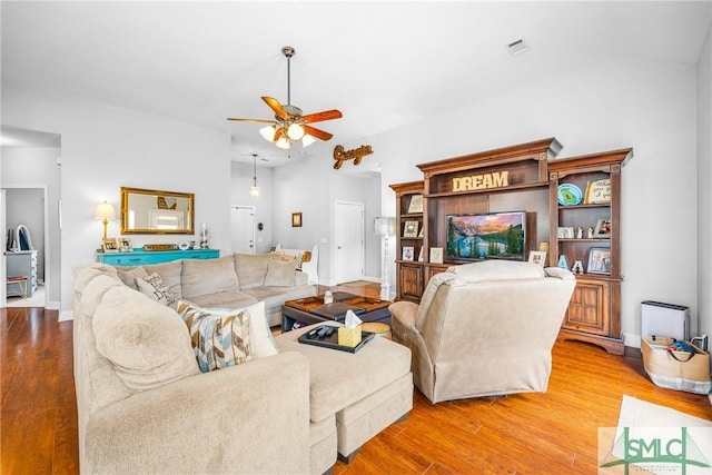 107 Christian Ct, Rincon, GA 31326 - living room featuring ceiling fan, wood finished floors, baseboards, and lofted ceiling