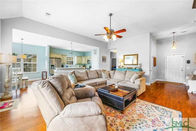 107 Christian Ct, Rincon, GA 31326 - living room featuring a ceiling fan, light wood-type flooring, baseboards, and lofted ceiling