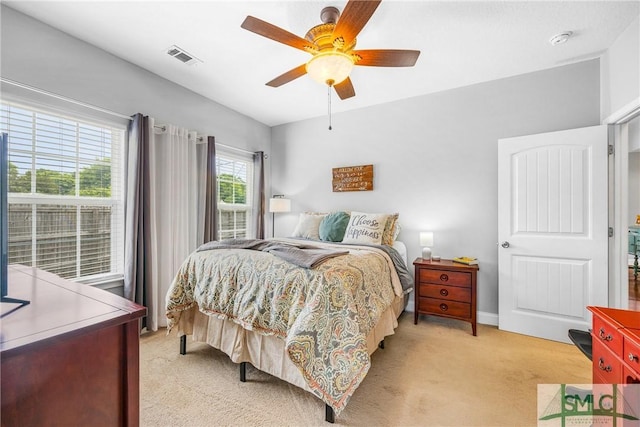 107 Christian Ct, Rincon, GA 31326 - bedroom with light carpet, a ceiling fan, and baseboards