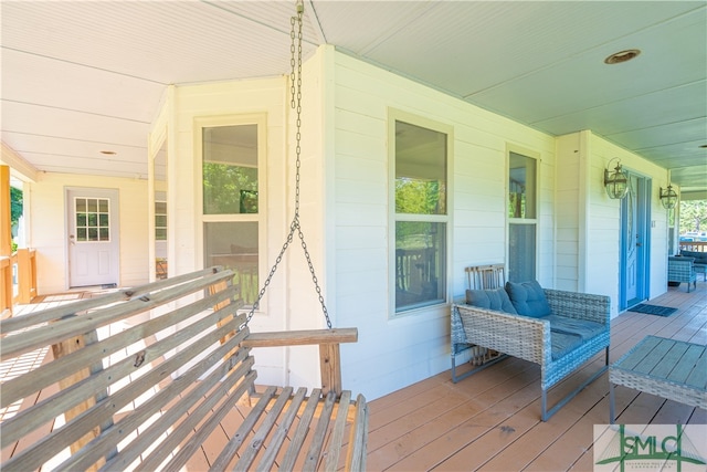 wooden deck with a porch