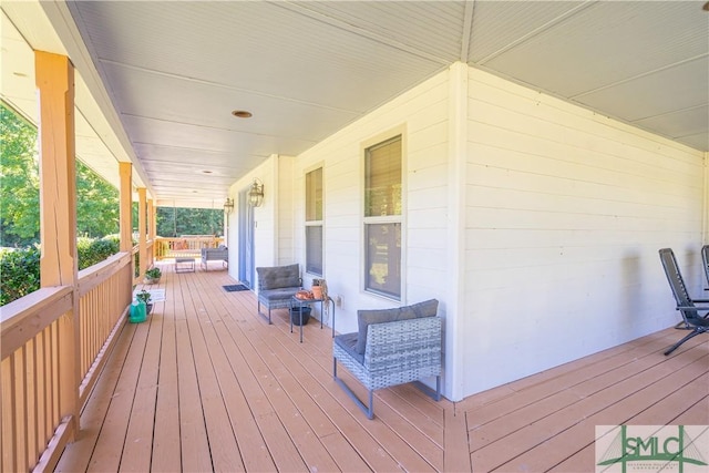 wooden deck featuring covered porch