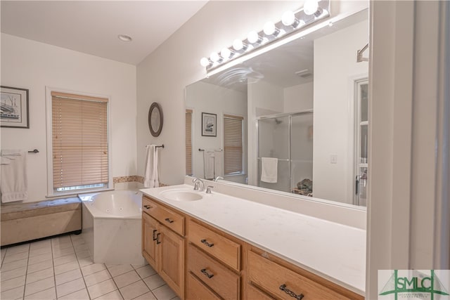 full bath featuring vanity, tile patterned floors, a stall shower, and a bath