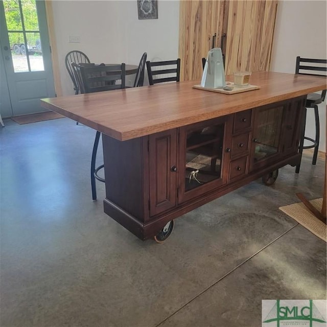 26 Cason Dr, Pembroke, GA 31321 - bar with finished concrete flooring