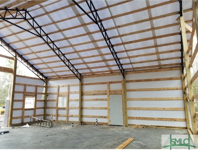26 Cason Dr, Pembroke, GA 31321 - miscellaneous room with a garage and concrete flooring