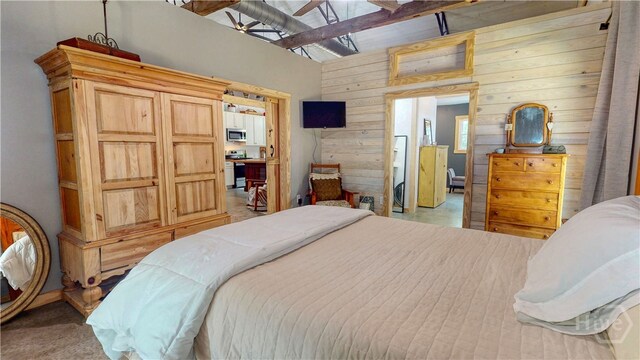 26 Cason Dr, Pembroke, GA 31321 - bedroom with wood walls and lofted ceiling