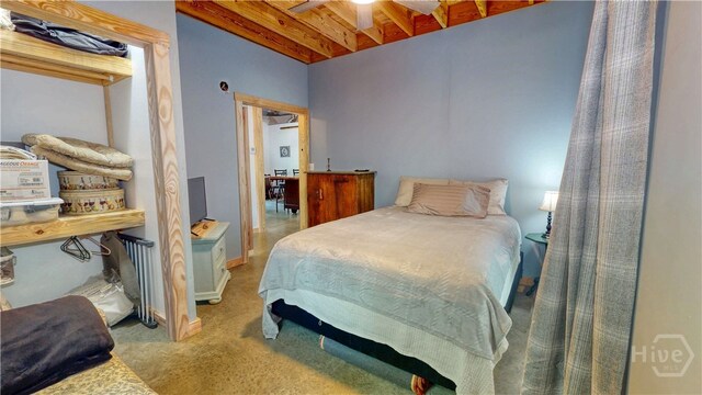 26 Cason Dr, Pembroke, GA 31321 - bedroom featuring beam ceiling and light colored carpet